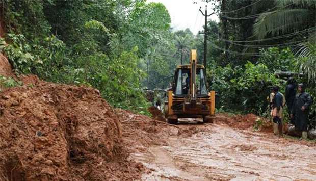 Rescuers at work after a landslide at Kuttampuzha village in Ernakulam district in Kerala state on Thursday.