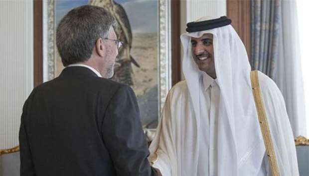 His Highness the Amir Sheikh Tamim bin Hamad al-Thani with the outgoing Swiss Ambassador Etienne Thevoz. 