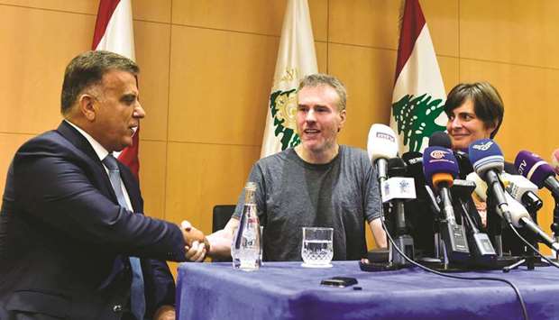 Kristian Lee Baxter (centre), a Canadian formerly held captive by the Syrian government, shakes hands with the Lebanese Head of General Security Major-General Abbas Ibrahim, during a press conference with Canadau2019s ambassador to Lebanon Emanuelle Lamoureux (right), following Baxteru2019s release, in the Lebanese capital Beirut yesterday.