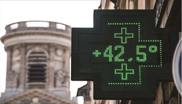 A pharmacy thermometer displaying a temperature of 42.5C, in Paris, as a new heatwave hits the French capital recently.