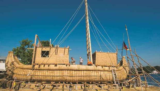 Members of the crew assemble the 14m long sailing reed boat Abora IV in the town of Beloslav, Bulgaria.