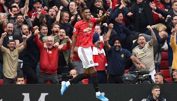 Manchester Unitedu2019s Marcus Rashford celebrates after scoring a goal during the EPL match against Chelsea at Old Trafford yesterday. (AFP)