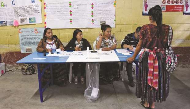 An indigenous woman comes to vote yesterday in Santa Cruz Chinautla, Guatemala.