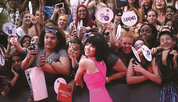 LOVED: Carly Rae Jepsen takes photos with fans