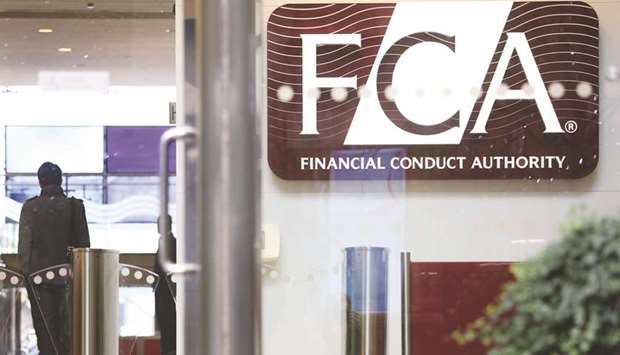 A logo is seen at the headquarters of the Financial Conduct Authority (FCA) in the Canary Wharf business district in London.