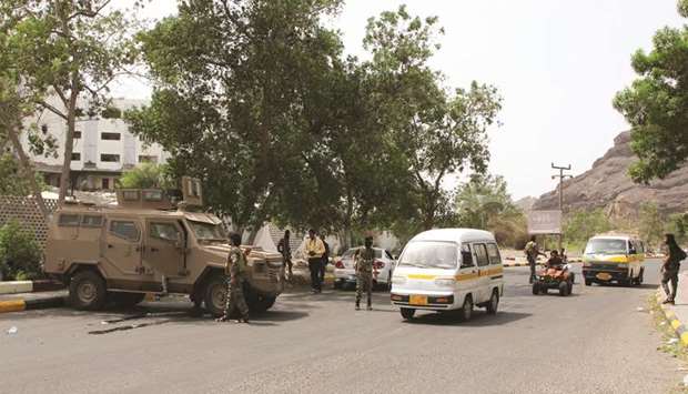 Yemenu2019s southern separatist troops man checkpoints in Aden, yesterday.
