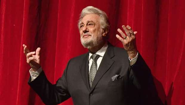 In this file photo taken on November 24, 2018 Spanish opera singer Placido Domingo speaks onstage at his 50th anniversary celebration at the season premiere of Trittico at the Metropolitan Opera in New York City