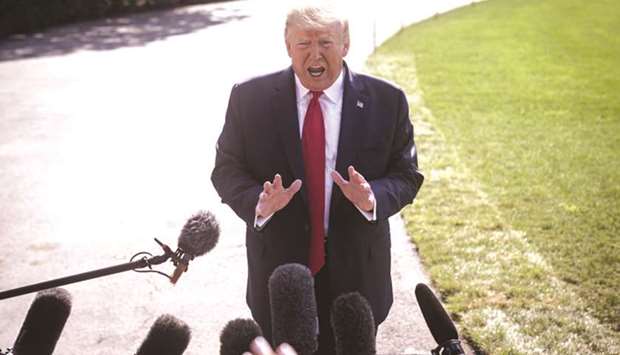 US President Donald Trump speaks to members of the media on the South Lawn of the White House in Washington, DC. u201cWeu2019re doing this for the Christmas season, just in case some of the tariffs would have an impact on US customers,u201d Trump told reporters as he prepared to depart from New Jersey for an event in Pittsburgh.