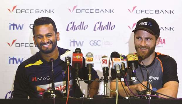 New Zealand captain Kane Williamson (right) and his Sri Lankan counterpart Dimuth Karunaratne smile during a joint press conference at the Galle International Cricket Stadium in Galle ahead of their first Test yesterday. (AFP)
