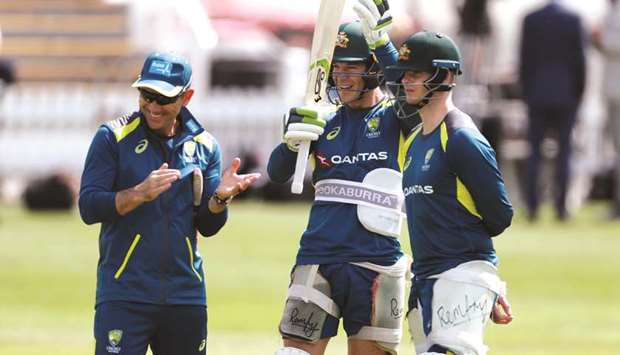Australia head coach Justin Langer (left), Tim Paine and Steve Smith (right) during a net session at the Lordu2019s Cricket Ground in London, Britain, yesterday. (Reuters)