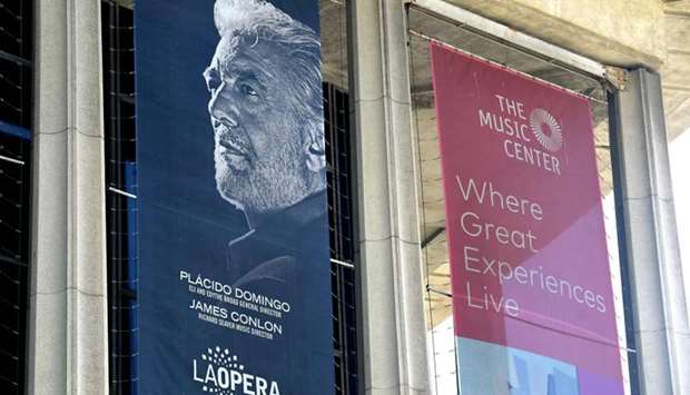 A banner showing the Los Angeles Opera's General Director, Spanish tenor Placido Domingo, hangs from the Dorothy Chandler Pavilion, home to the LA Opera yesterday in Los Angeles, California