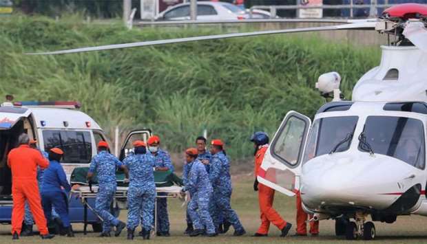 A body believed to be 15-year-old Irish girl Nora Anne Quoirin who went missing is brought out of a helicopter in Seremban. File picture: August 14, 2019