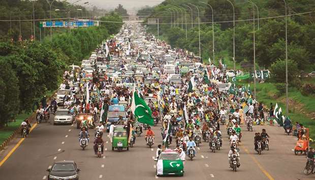 People take part in Independence Day celebrations in Islamabad yesterday, as the nation marks the 73rd Independence Day.