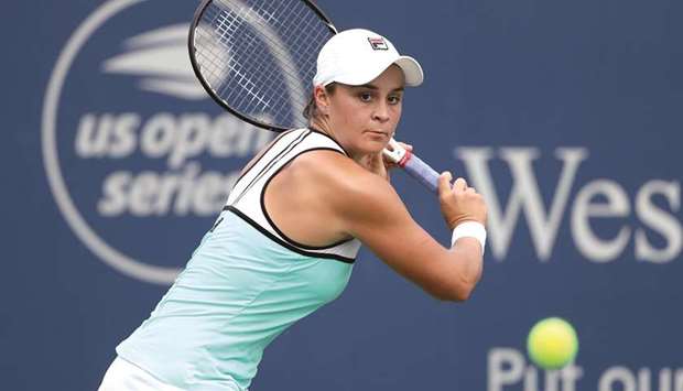 Ashleigh Barty of Australia returns a shot against Maria Sharapova (not pictured) of Russia during the Western & Southern Open at Lindner Family Tennis Center in Mason, United States, on Wednesday. (AFP)