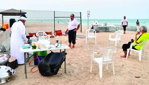 Senior citizens relaxing at one end of Al Wakrah Beach. PICTURE: Ram Chand