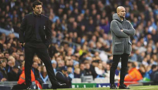 Tottenham manager Mauricio Pochettino (left) and his Manchester City counterpart Pep Guardiola. (Reuters)