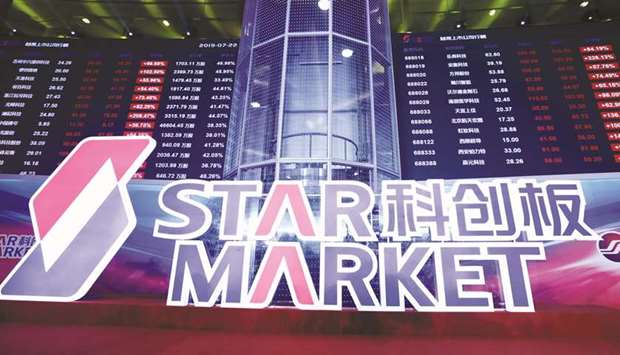 A sign for STAR Market, Chinau2019s new Nasdaq-style tech board, is seen after the listing ceremony of the first batch of companies at the Shanghai Stock Exchange (file). STAR Market, which allows pre-profit companies to list in China for the first time, gives venture capitalists a new way to exit investments in loss-making start-ups.