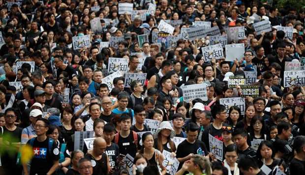 Teachers protest against the extradition bill during a rally organised by Hong Kong Professional Teachers' Union in Hong Kong, China