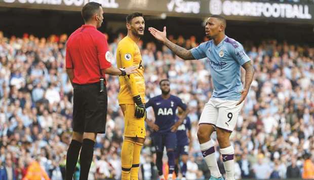 Manchester Cityu2019s Gabriel Jesus (right) remonstrates with referee Michael Oliver (left) after his goal was disallowed following a VAR review during the Premier League match against Tottenham Hotspur at the Etihad Stadium in Manchester yesterday. (Reuters)