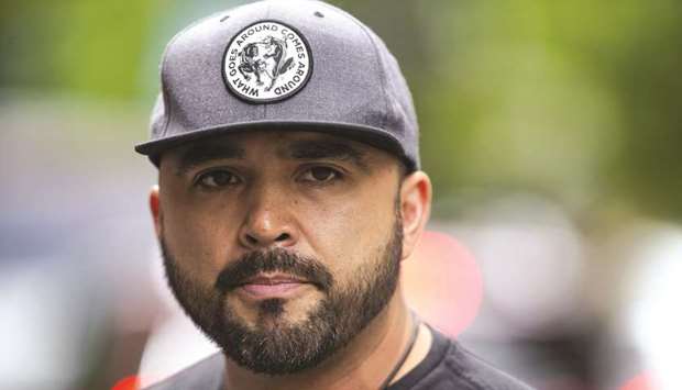 Right-wing leader Joey Gibson turned himself in to Portland city authorities on Friday.