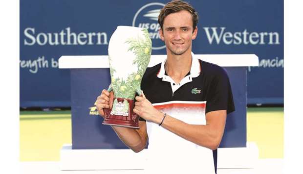 Daniil Medvedev of Russia poses with the trophy after defeating David Goffin of Belgium in the final to win the Cincinnati Masters in Mason, Ohio, on Sunday. (AFP)