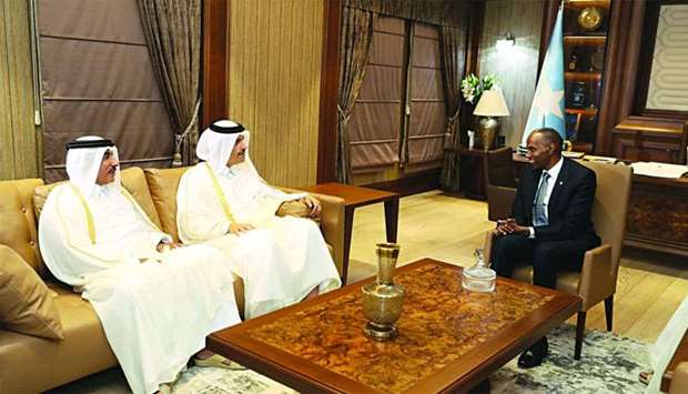 HE the Deputy Prime Minister and Minister of Foreign Affairs Sheikh Mohamed bin Abdulrahman al-Thani and HE the Minister of Transport and Communications Jassim bin Saif al-Sulaiti with the Somali Prime Minister Hassan Ali Khayre