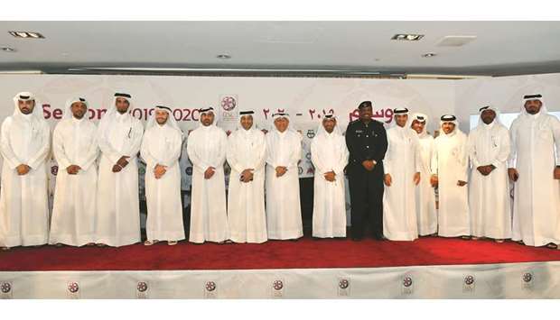 Qatar Stars League (QSL) CEO Hani Taleb Ballan, Marketing, Sales and Communication executive director Hassan Rabiah al-Kuwari, Competitions and Football Development executive director Ahmed Khellil Abbassi, Captain Saeed Juma al-Hitmi from Stadium Security Department and other officials at the new season launch Monday. PICTURES: Noushad Thekkayil
