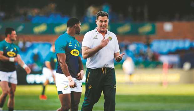 South Africa fullback Warrick Gelant listens to South Africa coach Rassie Erasmus during the warm up ahead of the Rugby Union World Cup warm-up match  against Argentina at the Loftus Versfeld Stadium in Pretoria, on August 17, 2019. (AFP)