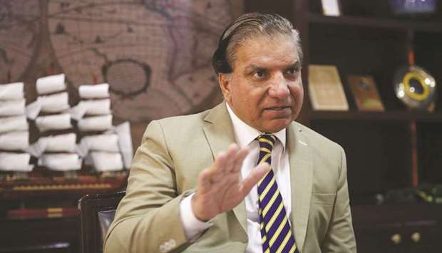 Wapda chairman Hussain gestures during an interview with Reuters at his office in Islamabad.