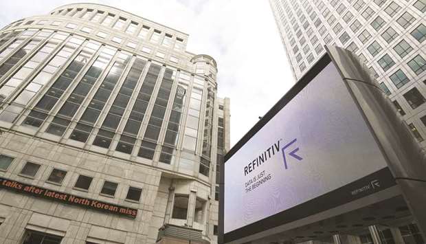 The Refinitiv logo is seen on a large screen in Canary Wharf in London.