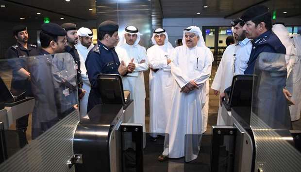 The Kuwaiti delegation listens to a briefing about the electronic gates at Hamad International Airport in Doha.