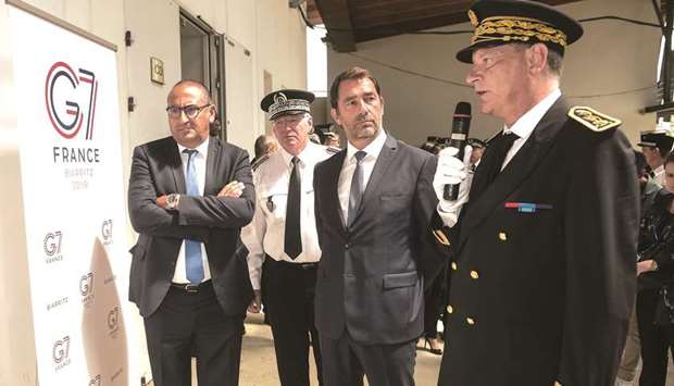 French Interior Minister Christophe Castaner, Junior Interior Minister Laurent Nunez (left), Prefect, Director General of the National Police Eric Morvan (second left), listen to Pyrenees-Atlantiques Prefect Eric Spitz (right) in Biarritz yesterday.