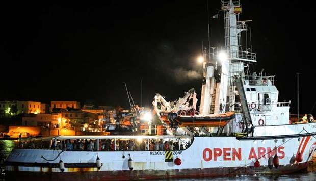 Spanish rescue ship Open Arms with migrants on board arrives in Lampedusa, Italy