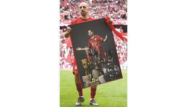 In this file photo taken on May 18, 2019 Bayern Munichu2019s French midfielder Franck Ribery leaves the field after a farewell ceremony prior the Bundesliga match against Eintracht  Frankfurt in Munich. (AFP)
