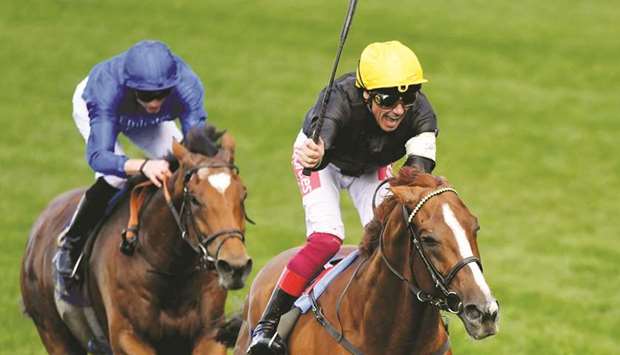 In this June 20, 2019, picture, Stradivarius is ridden by Frankie Dettori (right) to Gold Cup victory at Royal Ascot.