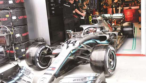 Mercedesu2019 driver Lewis Hamilton leaves the pit before the second practice session for the Hungarian Grand Prix at the Hungaroring circuit in Mogyorod, Hungary, yesterday. (AFP)