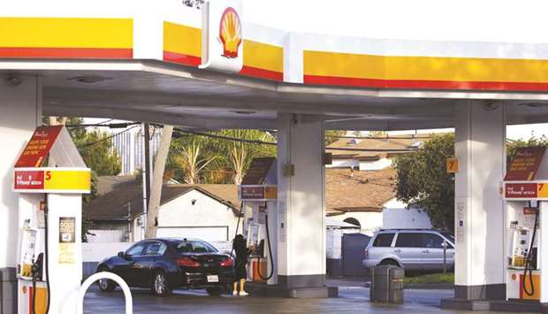 A customer refuels a vehicle at a Royal Dutch Shell gas station in Torrance, California. The company made its first foray into Australiau2019s highly competitive power sector with a A$617mn ($419mn) takeover offer for ERM Power.