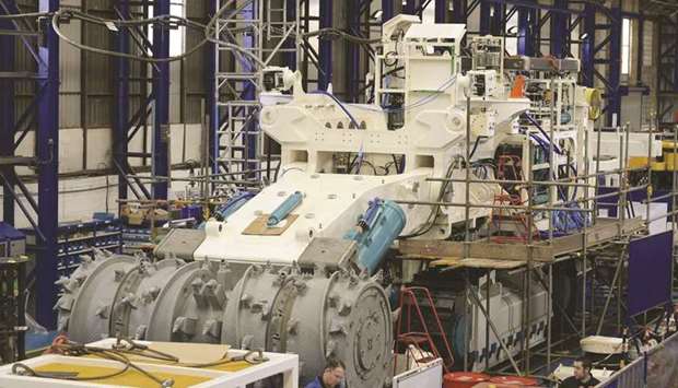 File picture: Employees of Soil Machine Dynamics (SMD) work on a subsea mining machine being built for Nautilus Minerals at Wallsend, northern England.