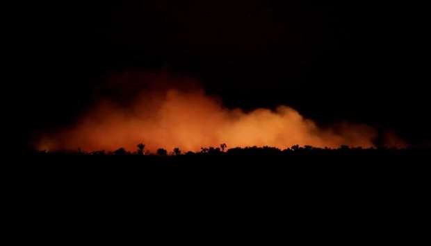 Smoke billows during a fire in an area of the Amazon rainforest near Humaita, Amazonas State, Brazil,