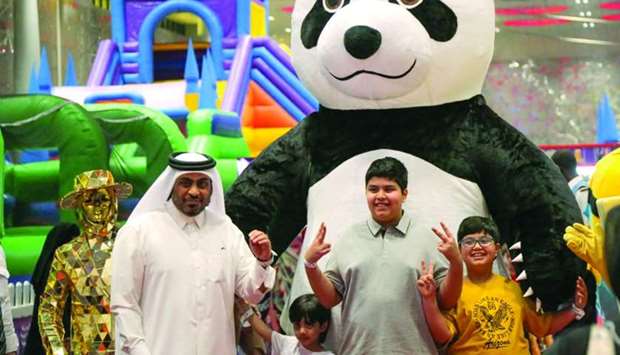 Visitors to the Summer Entertainment City in the company of a 'Panda' (supplied picture).