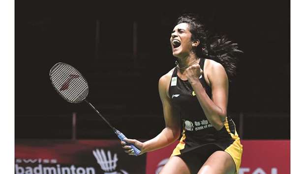 Indiau2019s PV Sindhu celebrates her victory over Taiwanu2019s Tai Tzu Ying in their womenu2019s singles quarter-final at the BWF Badminton World Championships in Basel yesterday.