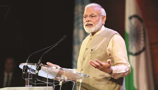 Prime Minister Narendra Modi addresses the Indian Community at Unesco headquarters in Paris yesterday.