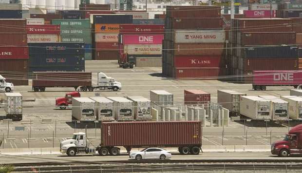 Shipping containers from China and Asia are unloaded at the Long Beach port, California. President Donald Trump hit back at China on Friday, in their mounting trade war, raising existing and planned tariffs in retaliation for Beijingu2019s announcement earlier in the day of new duties on American goods.
