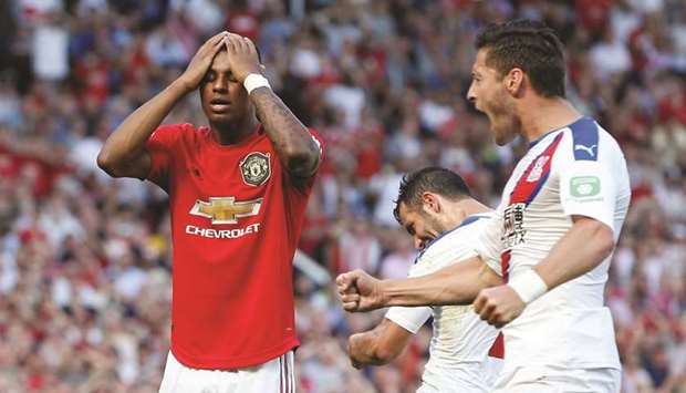 Manchester Unitedu2019s Marcus Rashford reacts after missing a penalty against Crystal Palace during the Premier League match at the Old Trafford in Manchester yesterday. (Reuters)