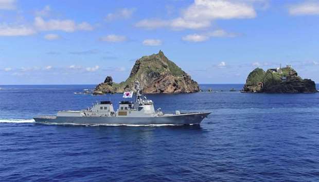 South Korean Navy's Aegis-equipped destroyer, Sejong the Great, participating in a military drill re-named ,East Sea territory defence training, near the easternmost islets of Dokdo