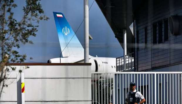 The air-plane which carried Iran's Foreign Minister Mohammad Javad Zarif stands on the tarmac at the airport of the French seaside resort of Biarritz, south-west France, during the G7 summit in Biarritz