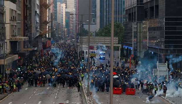 Protesters clash with police in Ngau Tau Kok in Hong Kong, China
