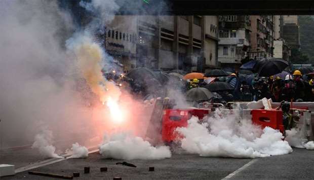 Police fire tear gas during a protest in Tsuen Wan district of Hong Kong