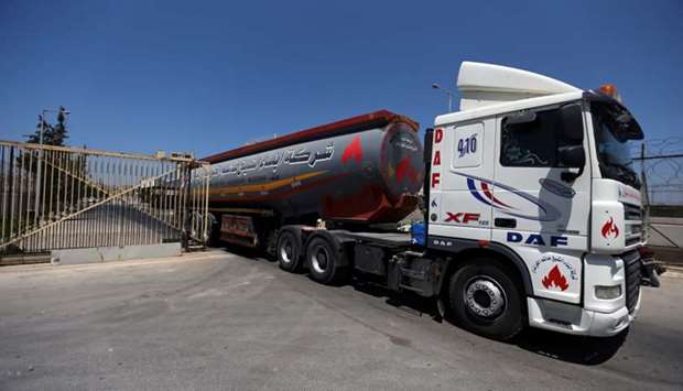 A fuel tanker leaves the Gaza power plant in the central Gaza Strip