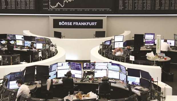 The DAX graph is seen at the Frankfurt Stock Exchange. The DAX 30 rose 0.6% to 11,730.02 points yesterday.